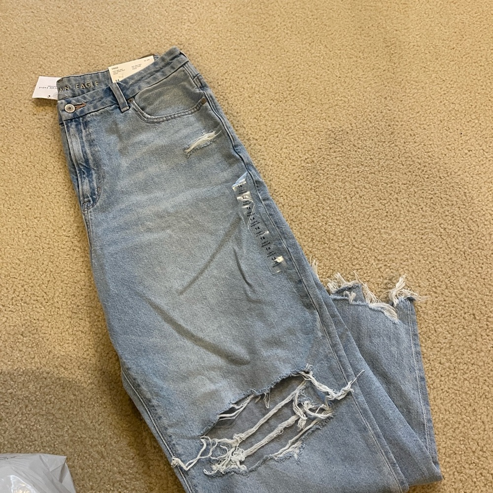 Women's Distressed Blue Jeans
